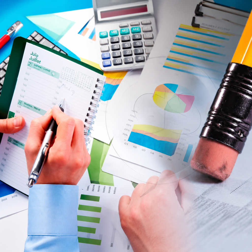 Una persona escribe en una agenda abierta sobre documentos financieros, gráficos y una calculadora, con un borrador de lápiz en primer plano.